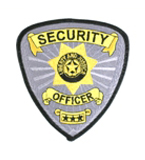 SECURITY – 7 PT STAR W/ SCROLLS – GOLD/BLACK ON SI…